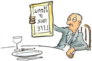 一位老人坐在餐桌前的椅子上，看着一份题为“你的人生菜单”的菜单。